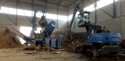 Caricatore Terex Fuchs e trituratore mobile Lindner Urraco